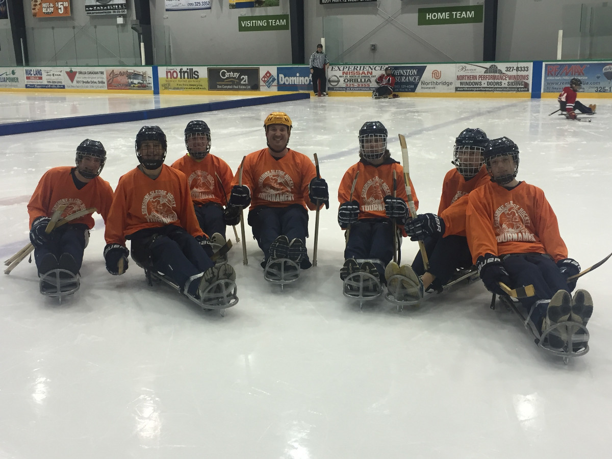 sledge_hockey_team_orange.JPG
